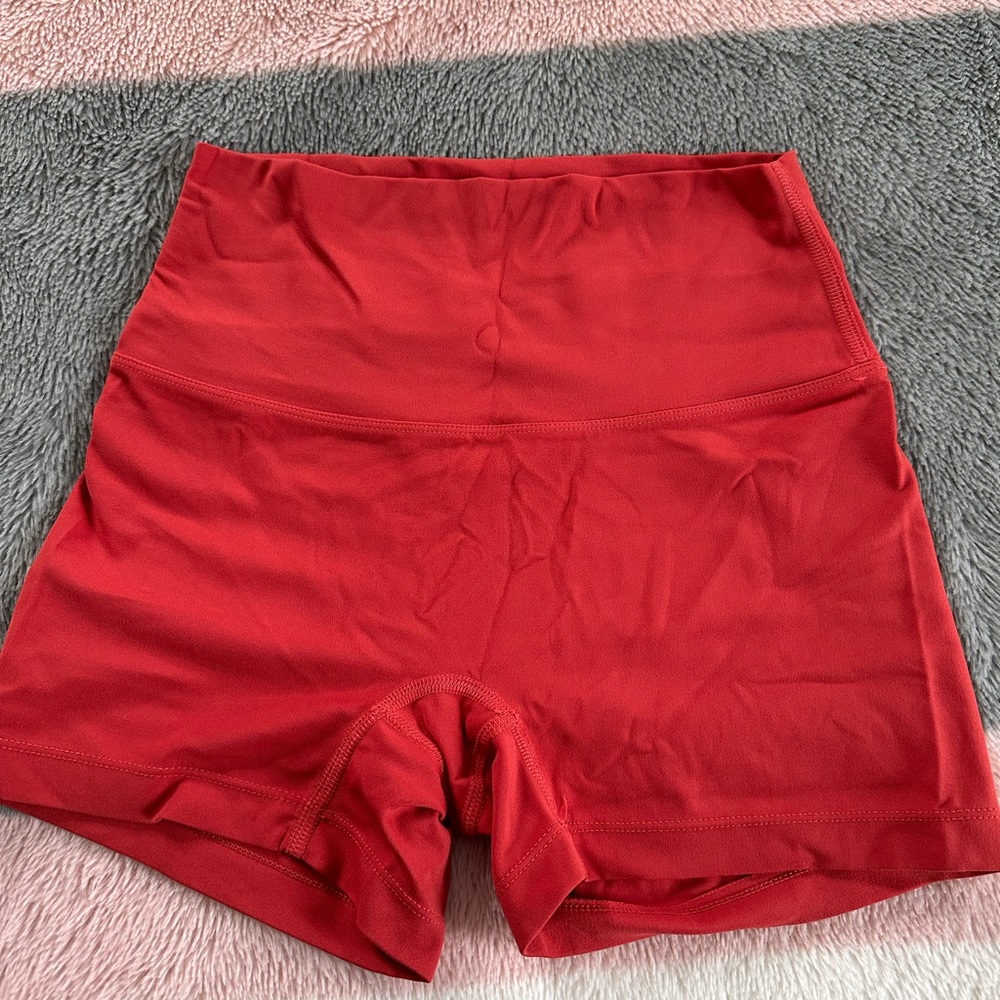 Lululemon size small, red shorts, DUPE